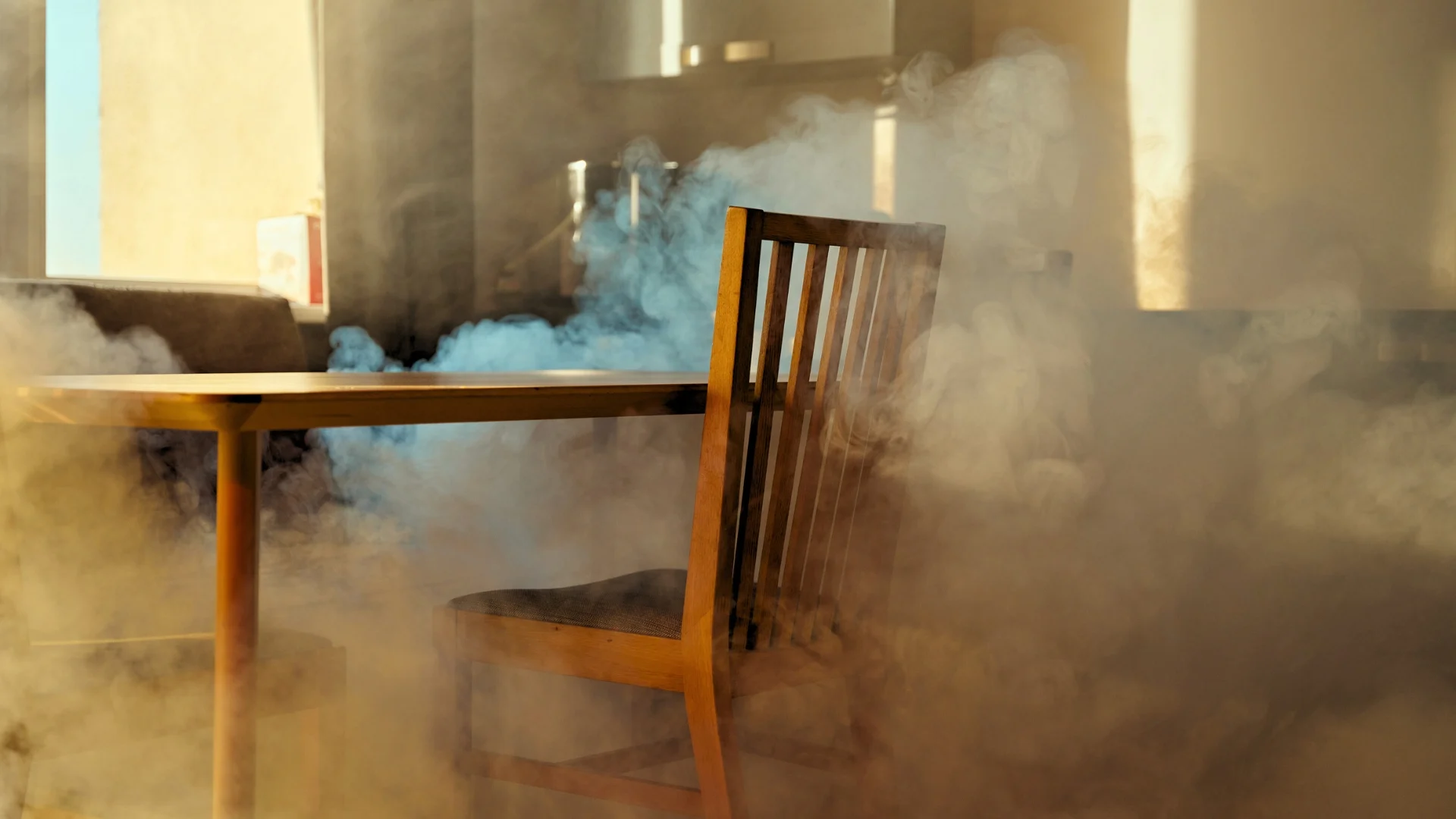 Smoky room with wooden furniture